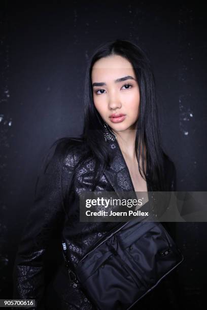 Model poses ahead of the Riani show during the MBFW January 2018 at ewerk on January 16, 2018 in Berlin, Germany.