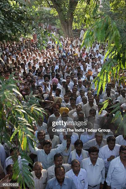 Bahujan Samaj Party workers gathered to pay their last respects to their party founder Kanshi Ram, in New Delhi on Monday. Kanshi Ram died of a heart...