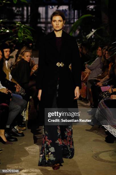 Model walks the runway during the Lena Hoschek Fashion Show Berlin at Botanischer Garten on January 16, 2018 in Berlin, Germany.