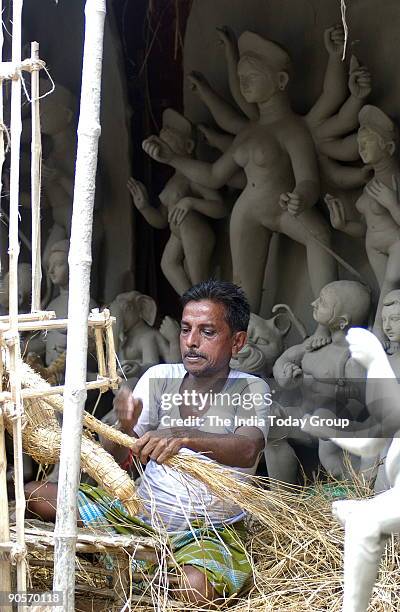 Artists making Durga idols in Kumartuli, Kolkata, West bengal, India