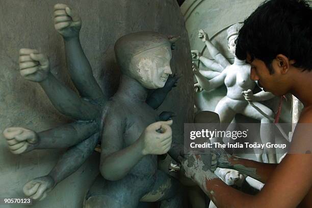 Artists making Durga idols in Kumartuli, Kolkata, West bengal, India