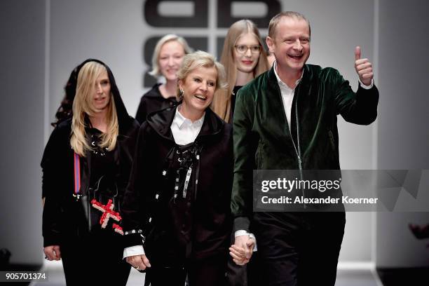Designers Ulrich Schulte and Isi Degel acknowledge the applause of the audience after the Riani show during the MBFW Berlin January 2018 at ewerk on...