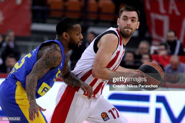 Vangelis Mantzaris, #17 of Olympiacos Piraeus competes with Pierre Jackson, #55 of Maccabi Fox Tel Aviv during the 2017/2018 Turkish Airlines...