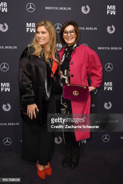 Astrid Rudolph and a guest attend the Riani show during the MBFW Berlin January 2018 at ewerk on January 16, 2018 in Berlin, Germany.