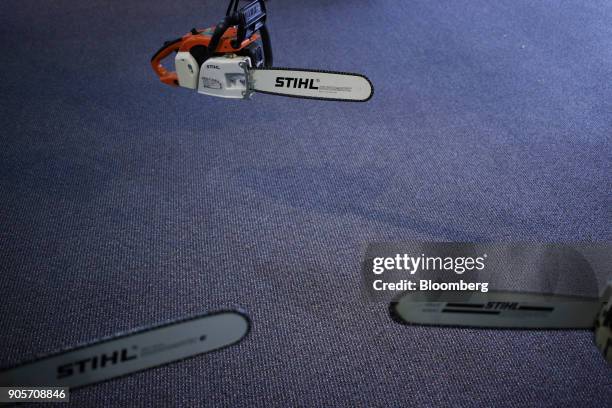 Chainsaws hang on display at the visitor center of the Stihl Inc. Manufacturing facility in Virginia Beach, Virginia, U.S., on Thursday, Jan. 11,...