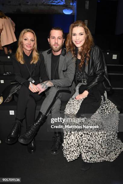 Martina Mueller-Callisti, her boyfriend Christoph Tauber-Romieri and Annett Moeller attend the Riani show during the MBFW Berlin January 2018 at...