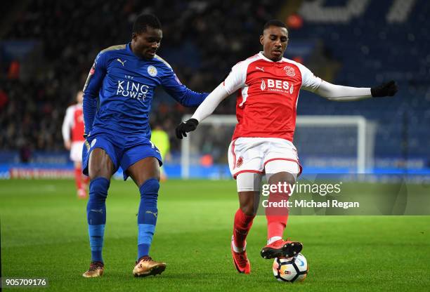 Amari'i Bell of Fleetwood Town is watched by Daniel Amartey of Leicester City during The Emirates FA Cup Third Round Replay match between Leicester...