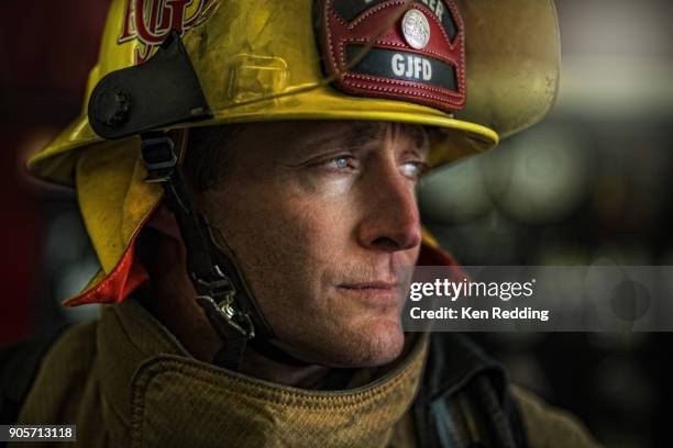 fire fighter portrait - feuerwache stock-fotos und bilder