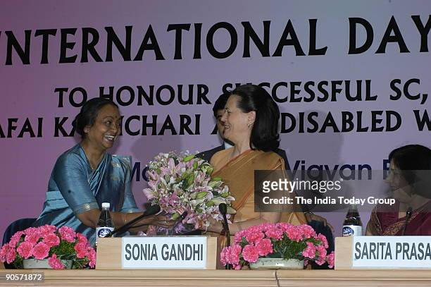 Sonia Gandhi, President of All India Congress Committee and United Progressive Alliance Chairperson along with Meira Kumar, Union Cabinet Minister...
