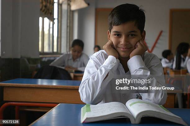 Students of Delhi Public School at RK Puram branch interacting with each other in their class room in New Delhi, India