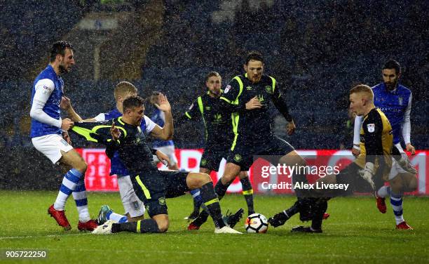 Richard Bennett of Carlisle United stretches for the ball as Cameron Dawson of Sheffield Wednesday blocks during The Emirates FA Cup Third Round...