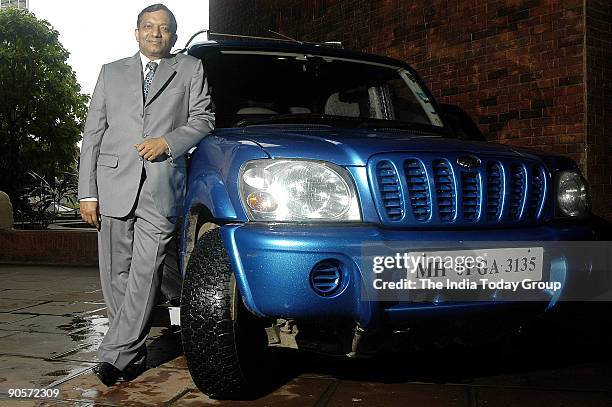 Pawan Goenka, Chief Operating Officer, Automotive Sector, Mahindra and Mahindra, poses with Scorpio Jeep / Car outside office, in Mumbai, India....