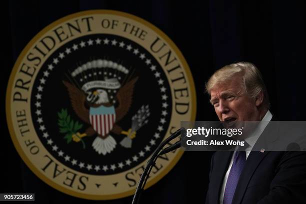 President Donald Trump speaks as he stops by a Conversations with the Women of America panel at the South Court Auditorium of Eisenhower Executive...