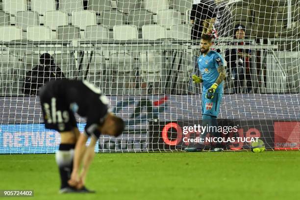 Bordeaux's French goalkeeper Benoit Costil gestures after conceding a goal during the French L1 football match between Bordeaux and Caen on January...