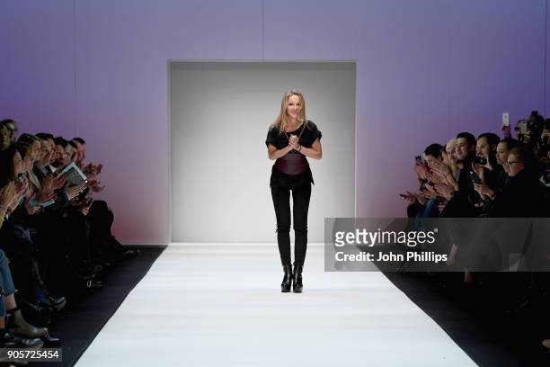 Designer Martina Mueller-Callisti acknowledges the applause of the audience after the Mercedes-Benz & ELLE present Callisti show during the MBFW...