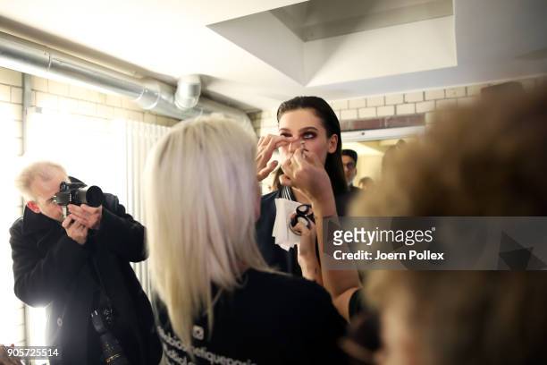 Model gets prepared ahead of the Mercedes-Benz & ELLE present Callisti show during the MBFW January 2018 at ewerk on January 16, 2018 in Berlin,...