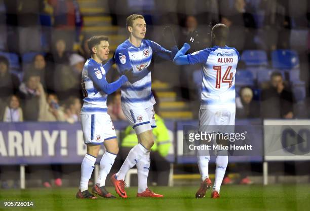 Jon Dadi Bodvarsson of Reading celebrates as he scores their first goal with team mates during The Emirates FA Cup Third Round Replay match between...