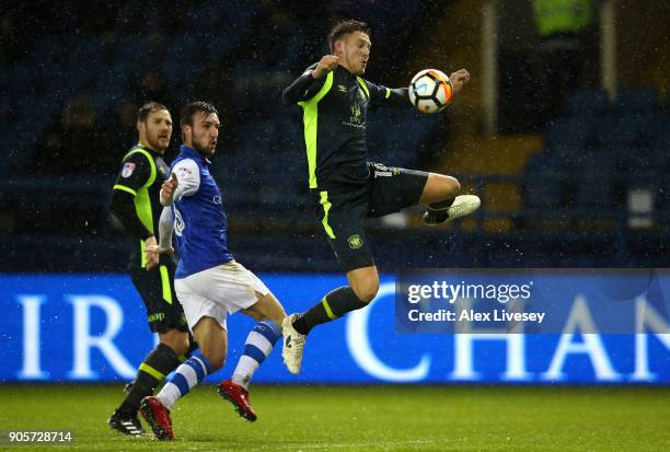 Richard Bennett of Carlisle United jumps for the ball during The Emirates FA Cup Third Round Replay match between Sheffield Wednesday and Carlisle...