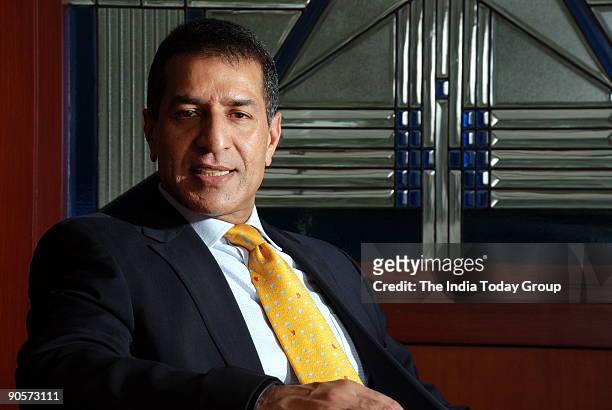 Rajan Mittal, Joint Managing Director, Bharti Tele Ventures Ltd , poses at office, in Delhi, India. Potrait, Sitting