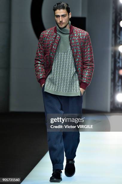 Model walks the runway at the Giorgio Armani show during Milan Men's Fashion Week Fall/Winter 2018/19 on January 15, 2018 in Milan, Italy.