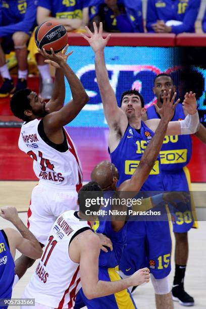 Hollis Thompson, #34 of Olympiacos Piraeus competes with Jake Cohen, #15 of Maccabi Fox Tel Aviv during the 2017/2018 Turkish Airlines EuroLeague...