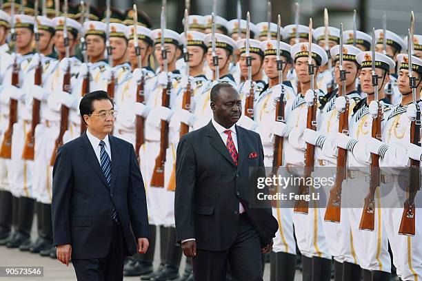 Chinese President Hu Jintao accompanies President of Central African Republic Francois Bozize Yangouvonda to view an honour guard during a welcoming...