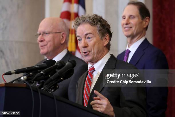 Sen. Rand Paul answers reporters questions during a news conference with Sen. Patrick Leahy and Sen. Ron Wyden about their proposed reforms to the...