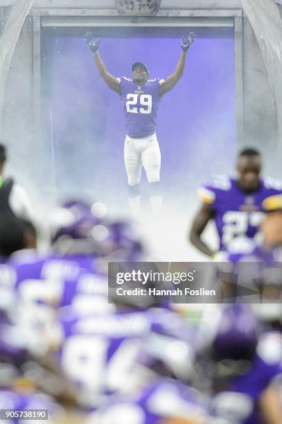 Xavier Rhodes of the Minnesota Vikings runs onto the field during player introductions before the NFC Divisional Playoff game against the New Orleans...