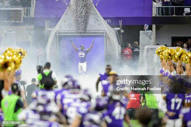 Xavier Rhodes of the Minnesota Vikings runs onto the field during player introductions before the NFC Divisional Playoff game against the New Orleans...