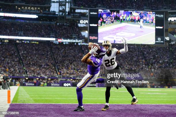 Williams of the New Orleans Saints breaks up a touchdown pass intended for Michael Floyd of the Minnesota Vikings during the first half of the NFC...