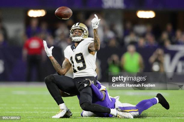 Mackensie Alexander of the Minnesota Vikings breaks up a pass intended for Ted Ginn of the New Orleans Saints during the first half of the NFC...