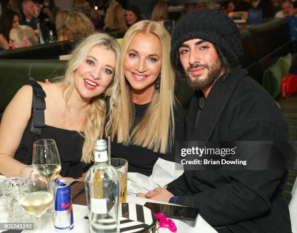 Tanja Comba, Caroline Beil, and hairstylist Apjar Black attend the Riani After Show Party during the MBFW Berlin January 2018 at Grace Restaurant on...