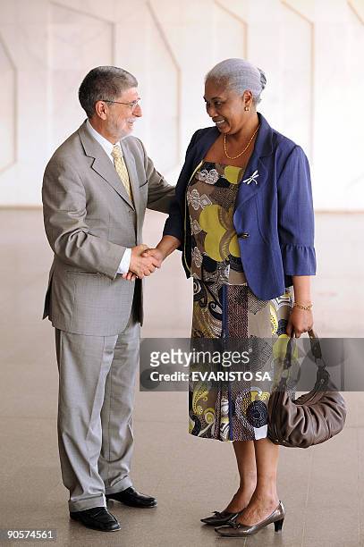 Suriname's Foreign Affairs Minister Lygia Kraag-Keteldijk his welcomed by his Brazilian counterpart Celso Amorim before a meeting at Itamaraty Palace...
