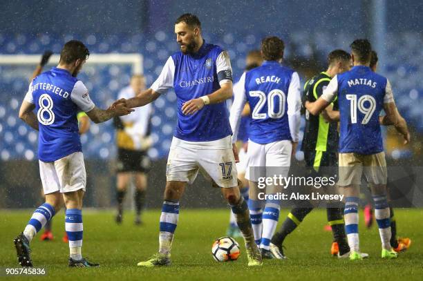 Atdhe Nuhiu and Jacob Butterfield of Sheffield Wednesday shake hands after The Emirates FA Cup Third Round Replay match between Sheffield Wednesday...