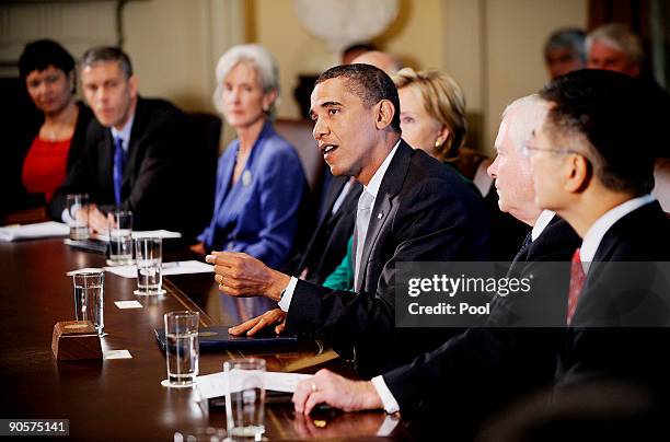 President Barack Obama speaks as Health and Human Services Secretary Kathleen Sebelius , Secretary of State Hillary Clinton Secretary of Defense...