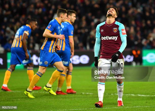Manuel Lanzini of West Ham United reacts as he misses a chance during The Emirates FA Cup Third Round Replay match between West Ham United and...