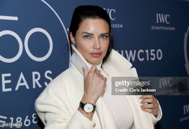 Adriana Lima visits the IWC booth during the Maison's launch of its Jubilee Collection at the Salon International de la Haute Horlogerie on January...