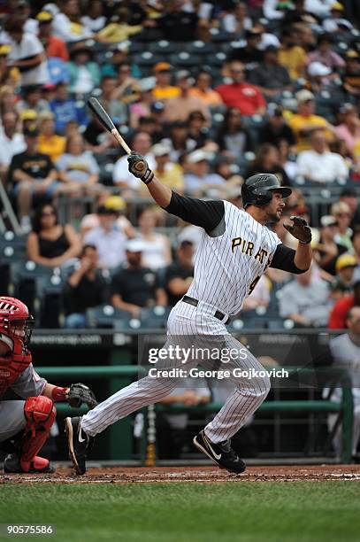 Outfielder Garrett Jones of the Pittsburgh Pirates bats during a Major League Baseball game against the Cincinnati Reds at PNC Park on August 23,...
