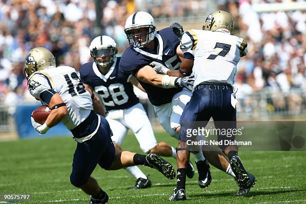 Linebacker Sean Lee of the Penn State Nittany Lions looks to make a tackle against the University of Akron Zips at Beaver Stadium on September 5,...