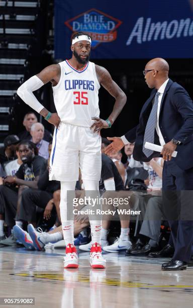 Assistant coach Sam Cassell of the Los Angeles Clippers coaches Willie Reed against the Sacramento Kings on January 11, 2018 at Golden 1 Center in...
