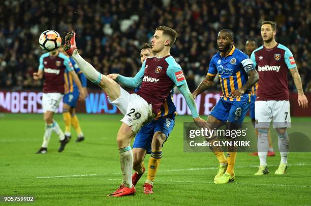 West Ham United's Spanish striker Antonio Martinez kicks the ball during the FA Cup third round replay football match between West Ham United and...