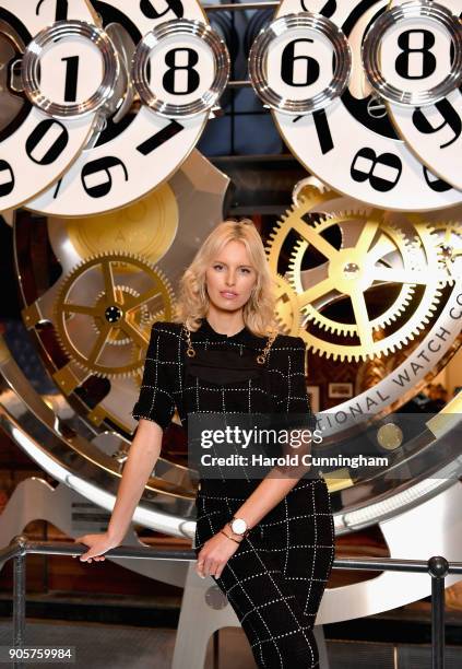 Karolina Kurkova visits the IWC booth during the Maison's launch of its Jubilee Collection at the Salon International de la Haute Horlogerie on...