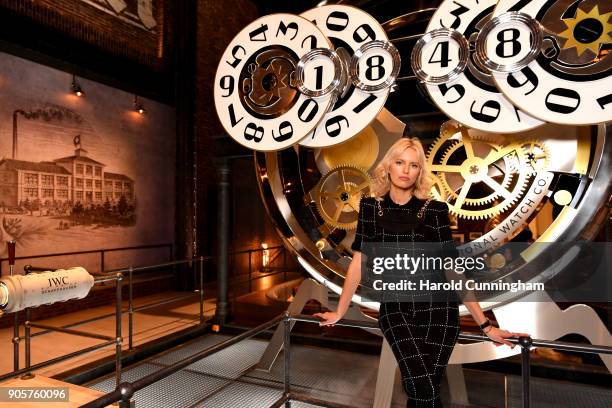 Karolina Kurkova visits the IWC booth during the Maison's launch of its Jubilee Collection at the Salon International de la Haute Horlogerie on...