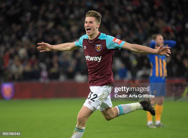 Reece Burke of West Ham United celebrates scoring the winning goal during The Emirates FA Cup Third Round Replay match between West Ham United and...