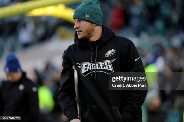 Carson Wentz of the Philadelphia Eagles looks on prior to the Philadelphia Eagles taking on the Atlanta Falcons during the NFC Divisional Playoff...