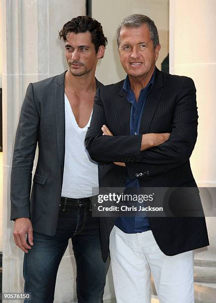 Photographer Mario Testino and model David Gandy attend Vogue and Burberry's cocktail reception as part of 'Fashion's Night Out' on September 10,...