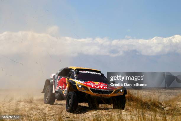 Stephane Peterhansel of France and Peugeot Total drives with co-driver Jean Paul Cottret of France in the 3008 DKR Peugeot car in the Classe : T1.4 2...