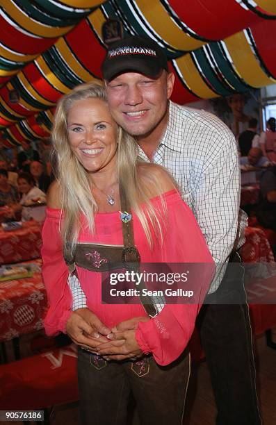 Boxer Axel Schulz and Patricia Reich attend the Berlin Oktoberfest on September 10, 2009 in Berlin, Germany.