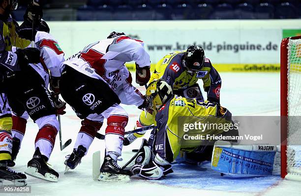 Scott Langkow of Krefeld saves the puck during the DEL Bundesliga game between Krefeld Pinguine and Koelner Haie at the Koenig Palast on September...