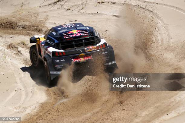 Carlos Sainz of Spain and Peugeot Total drives with co-driver Lucas Cruz of Spain in the 3008 DKR Peugeot car in the Classe : T1.4 2 Roues Motrices,...